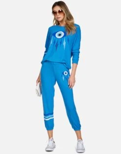 Everly Electric Evil Eye -Lauren Moshi Shop lauren moshi electric evil eye raglan pullover 1381 HAC 13191 SKBLU 08